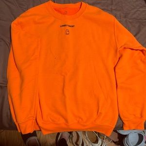 Bright orange lonely ghost crewneck